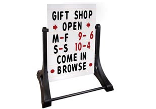 An XL white Swinger sidewalk changeable message sign.